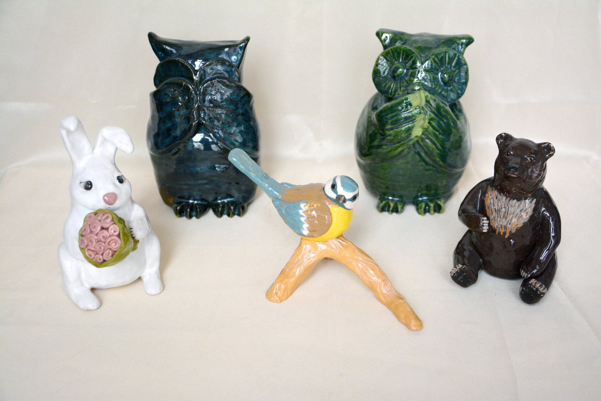 Ceramic figurines of animals and birds