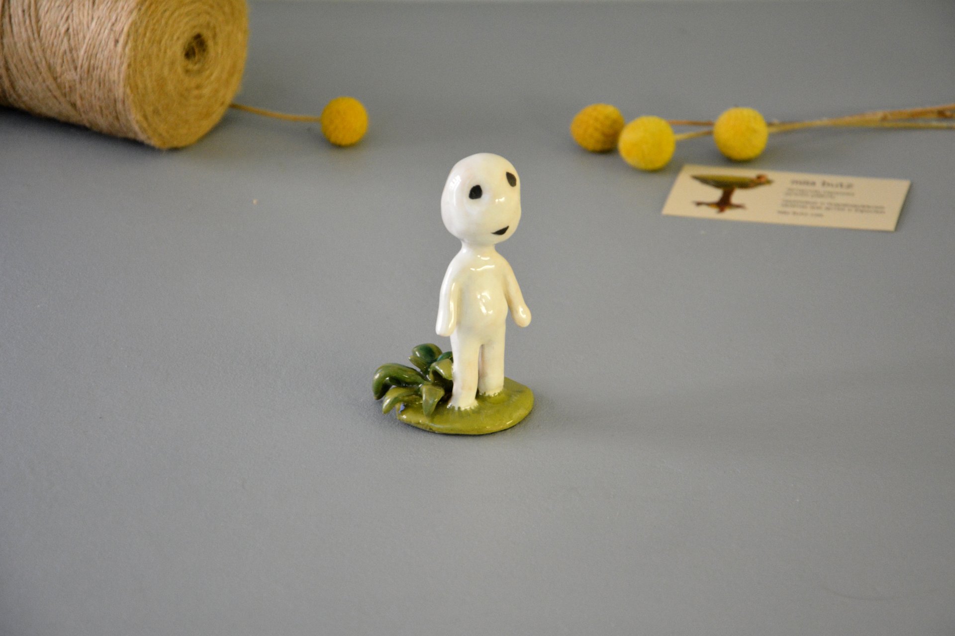 A figurine of a smiling Kodama tree spirit, height - 9.5 cm, photo 2 of 7.