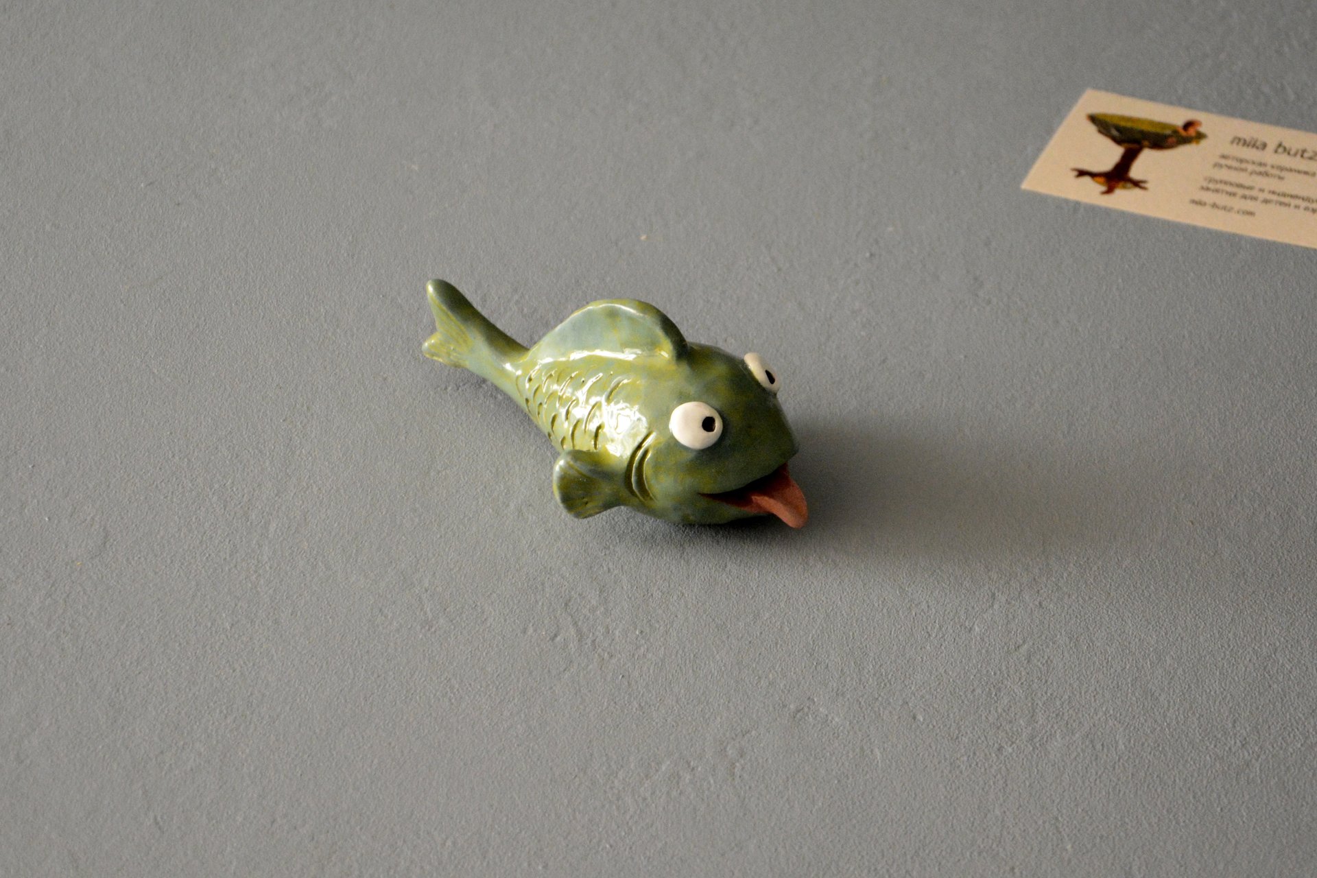 Ceramic fish figurine smiling, length - 12.5 cm, height - 6 cm, photo 1 of 6.