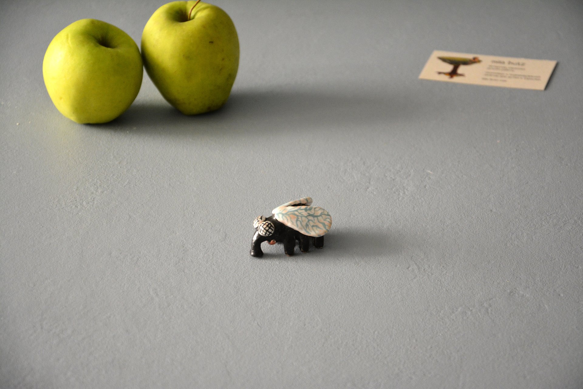 A figurine of a fly that sits, height - 3 cm, photo 3 of 4.