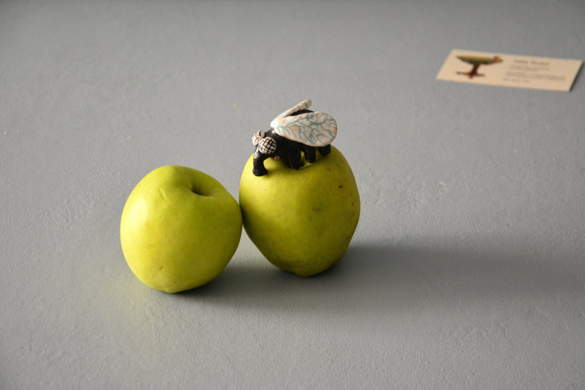 A figurine of a fly that sits, height - 3 cm, photo 1 of 4.