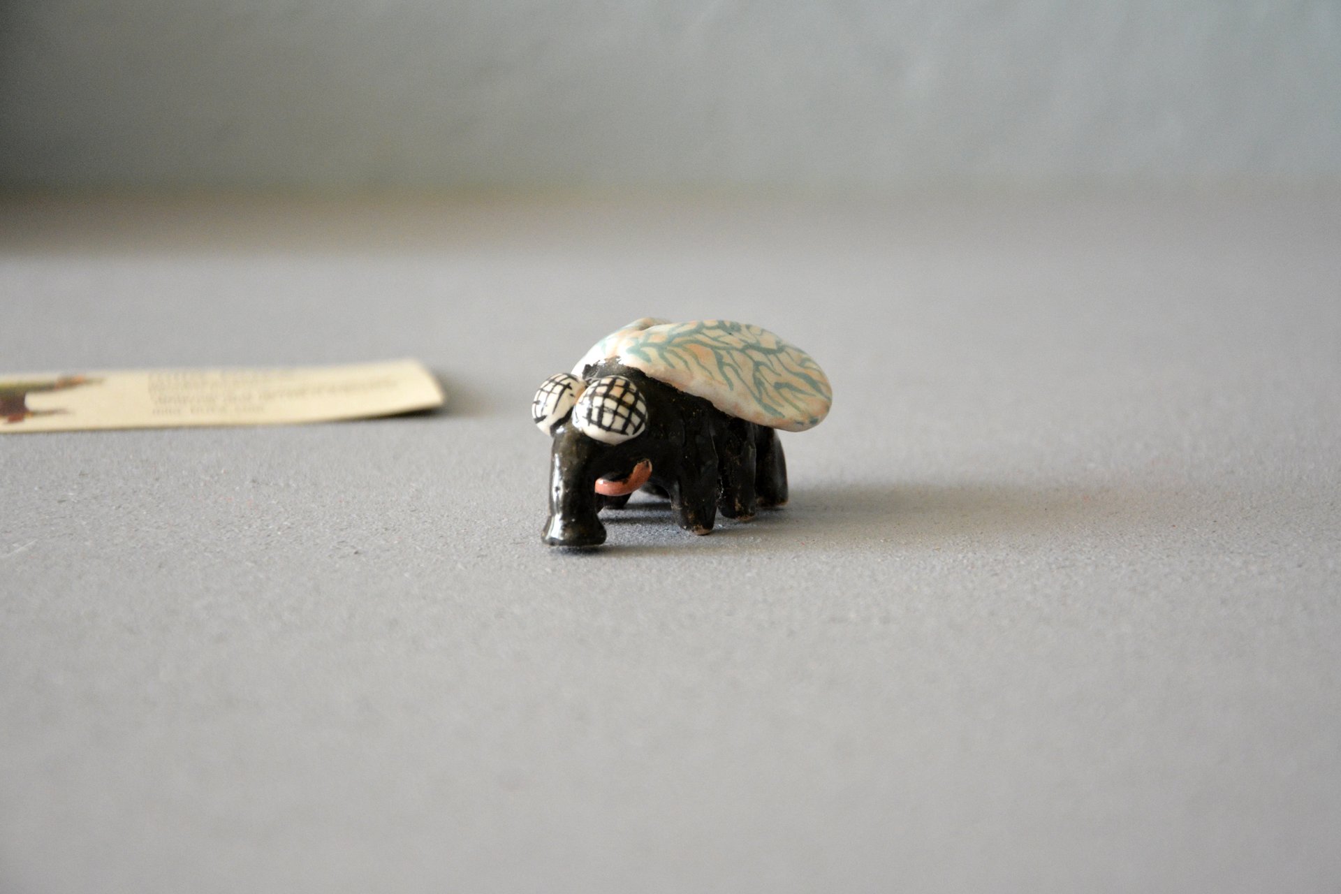 A figurine of a fly that sits, height - 3 cm, photo 2 of 4.