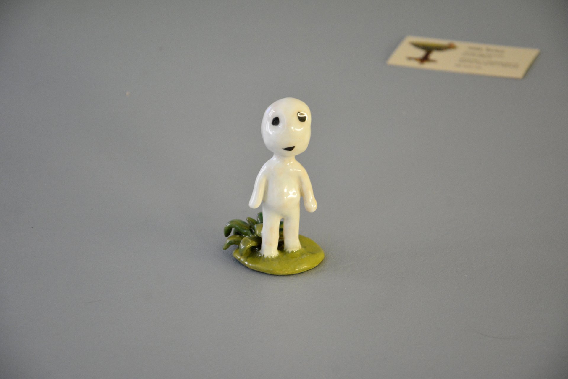 A figurine of a smiling Kodama tree spirit, height - 9.5 cm, photo 1 of 7.